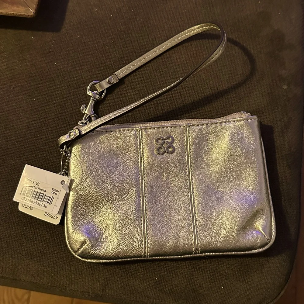Coach wristlet NWT gold‎